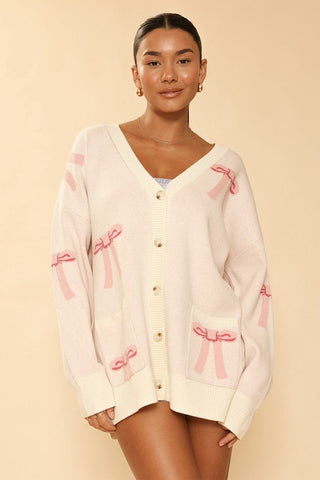 All Over Bow Knit Cardigan from Knit Cardigan collection you can buy now from Fashion And Icon online shop